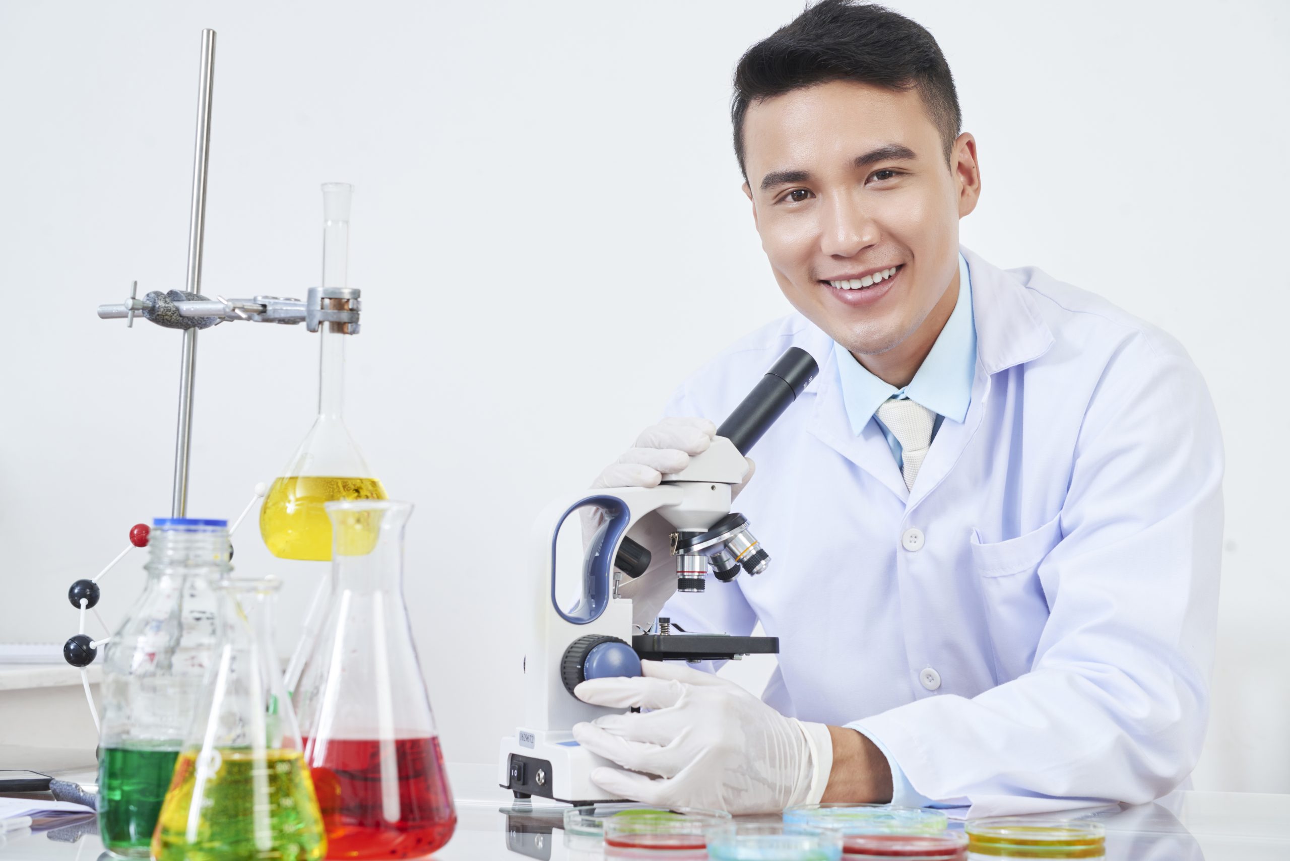Cheerful Vietnamese chemist